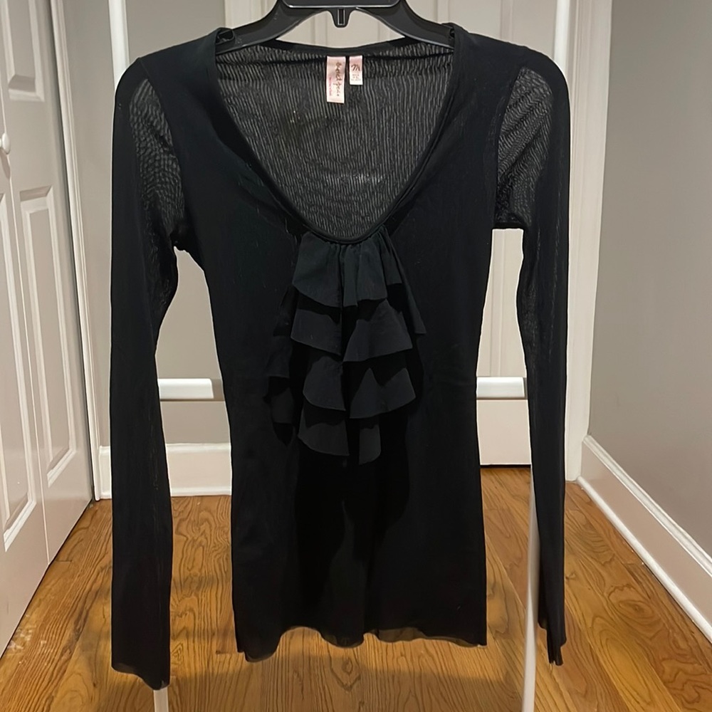 Sheer black top. Sweet Pea by Staci Frati.